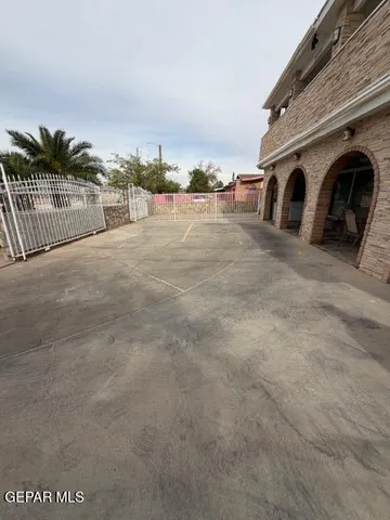 a view of yard with seating area and furniture