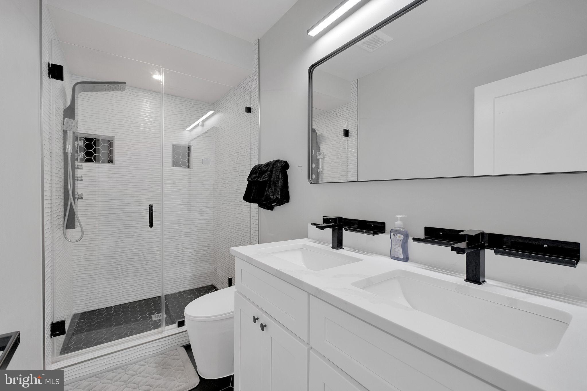 3811 Suitland Road Southeast Washington, DC 20020 - Photo 21 of 47 Spa like primary ensuite bath.