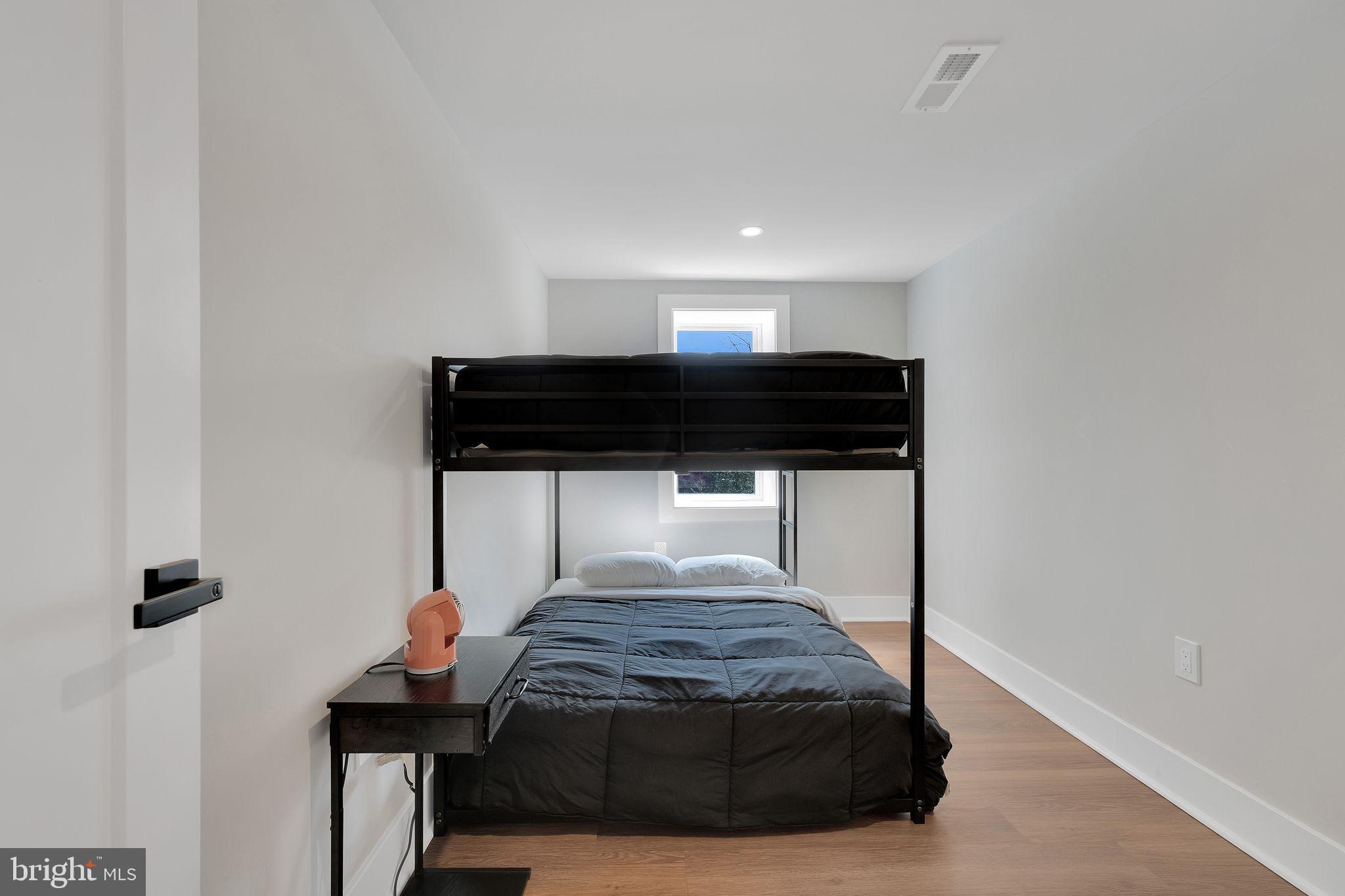 3811 Suitland Road Southeast Washington, DC 20020 - Photo 33 of 47 Additional minimalist bedroom.