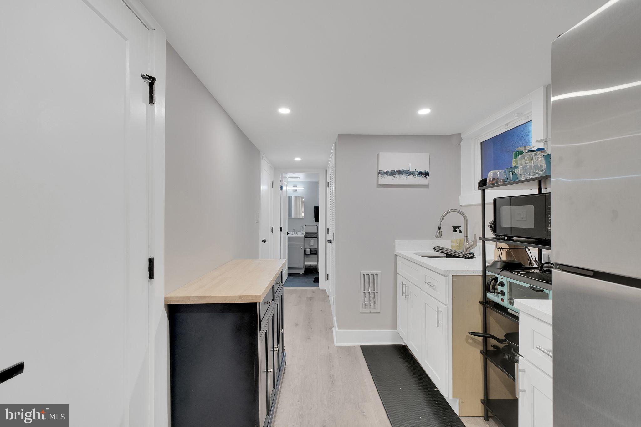 3811 Suitland Road Southeast Washington, DC 20020 - Photo 40 of 47 Lower level kitchenette.
