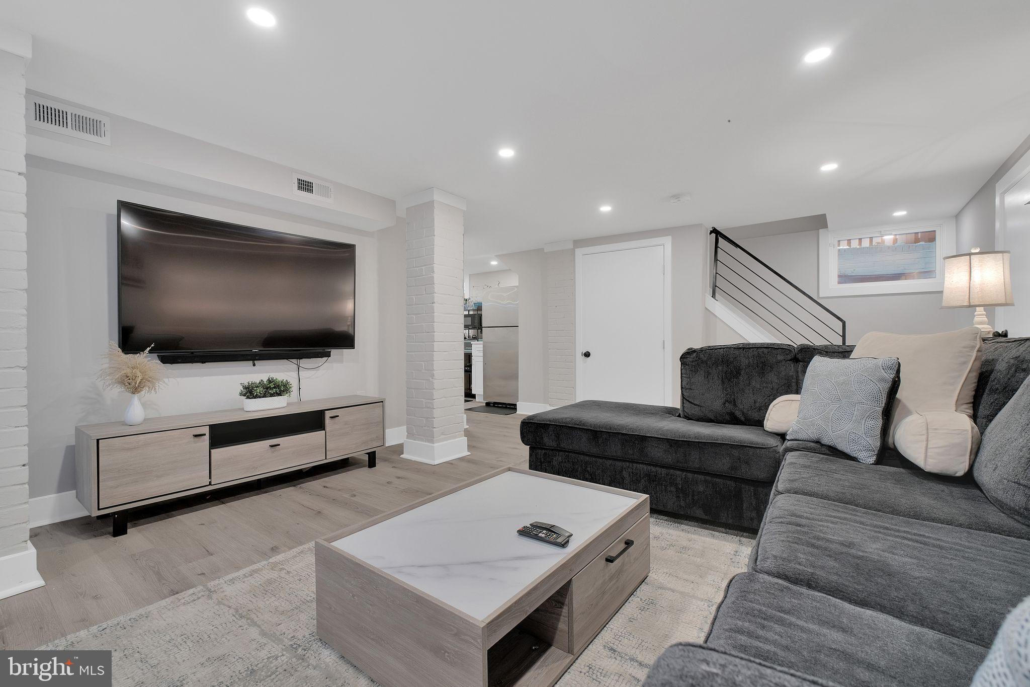 3811 Suitland Road Southeast Washington, DC 20020 - Photo 42 of 47 Finished LL complete with bed, kitchenette &
bath