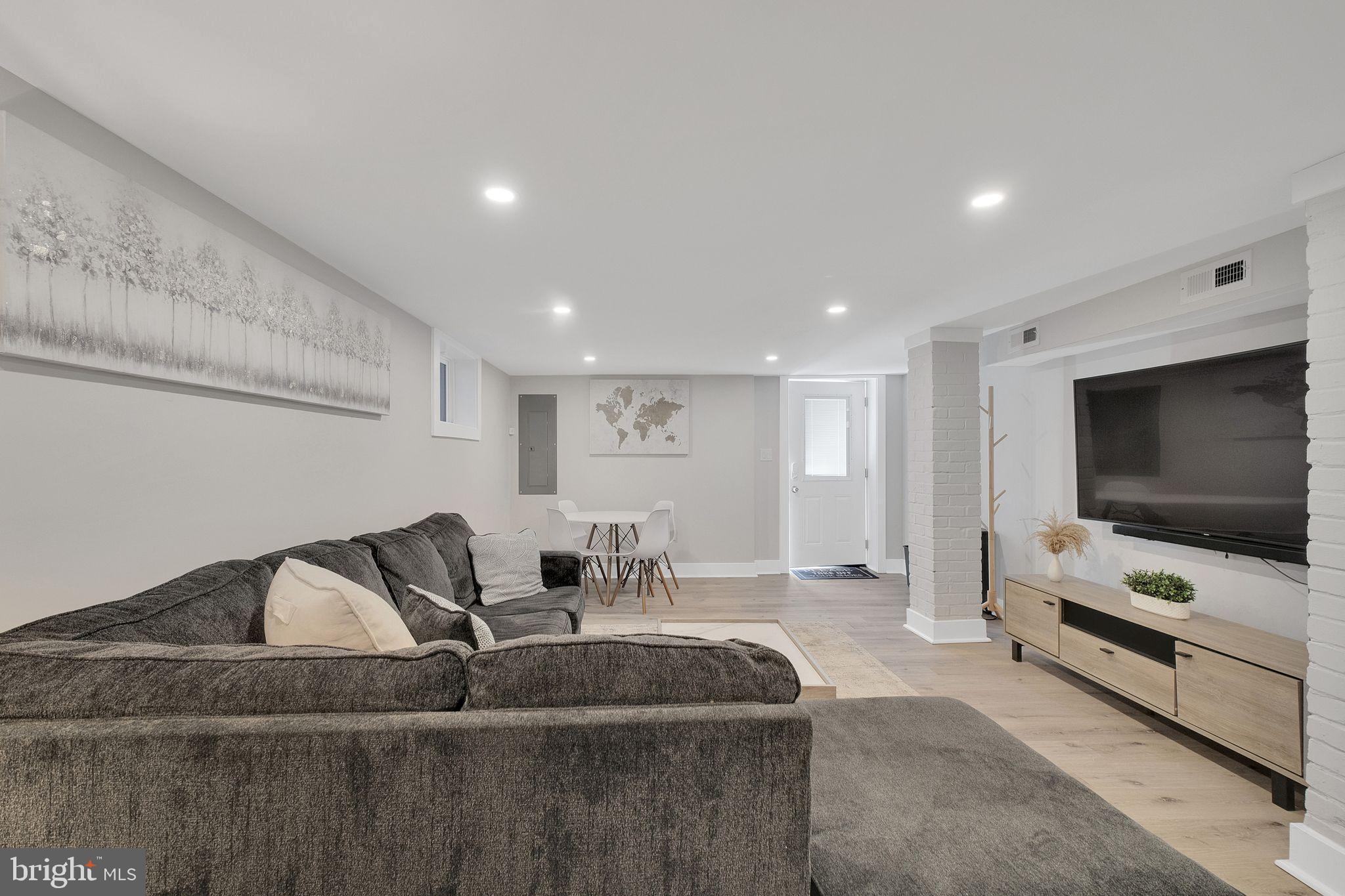 3811 Suitland Road Southeast Washington, DC 20020 - Photo 43 of 47 Modern, inviting basement retreat.