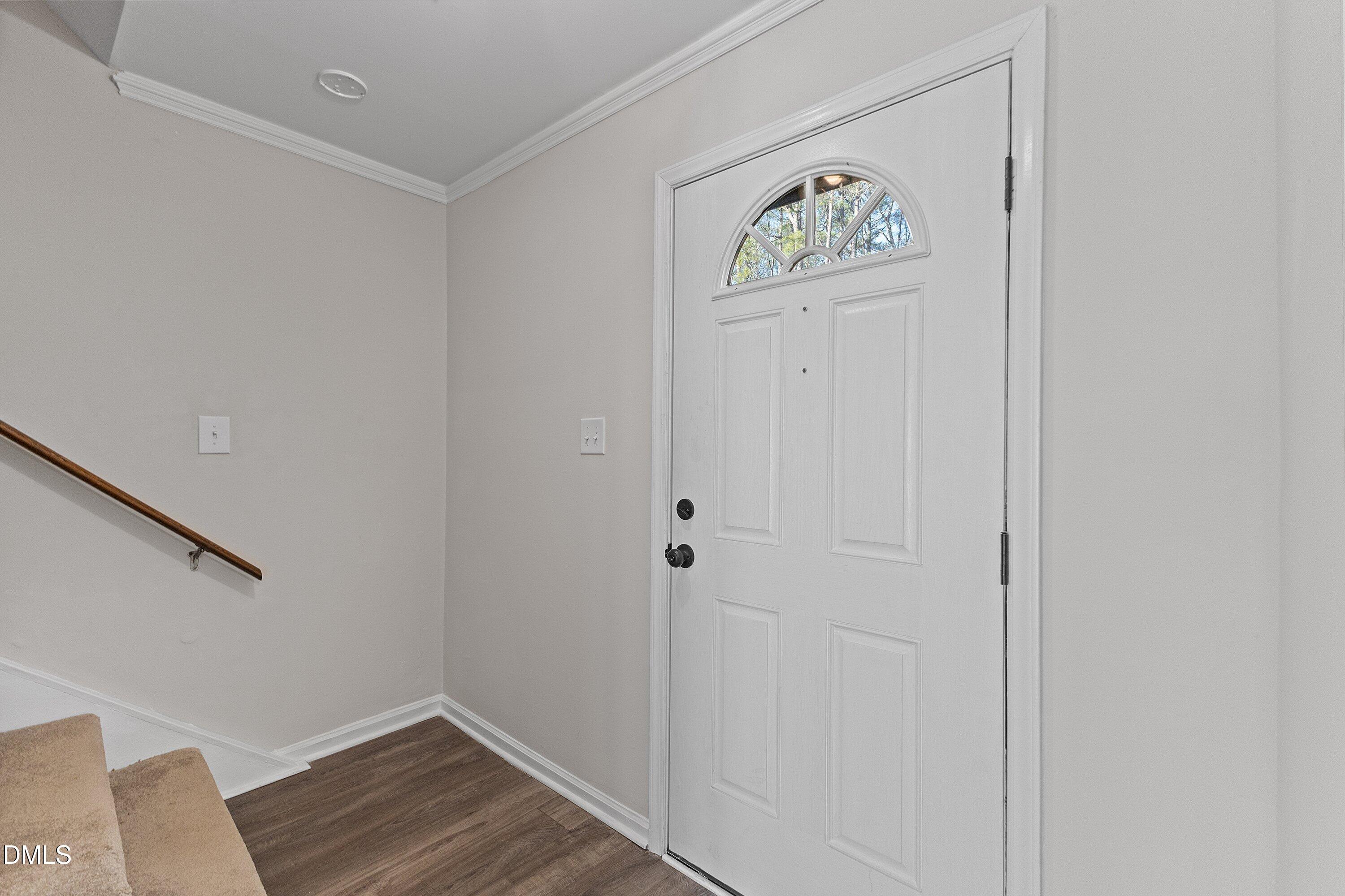 1900 Township Circle Raleigh, NC 27609 - Photo 2 of 19 a view of an entryway with wooden floor
