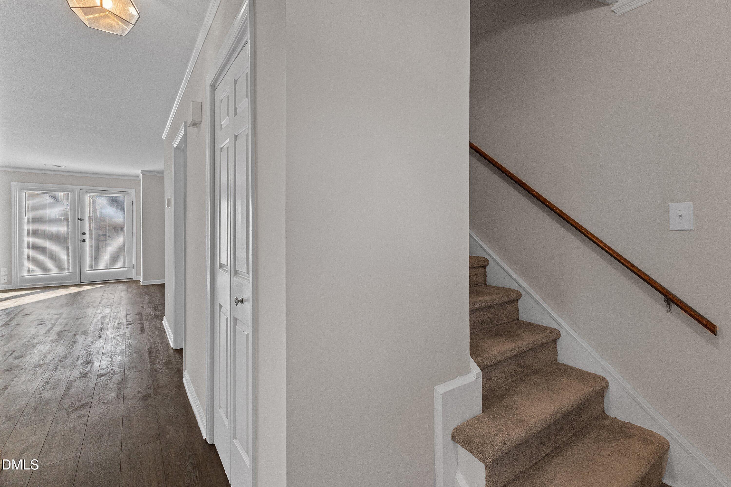 1900 Township Circle Raleigh, NC 27609 - Photo 3 of 19 a view of entryway with wooden floor and stairs
