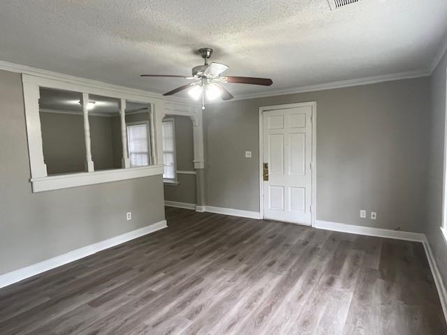 1021 Getwell Road Memphis, TN 38111 - Photo 4 of 25 a view of an empty room with wooden floor and a window