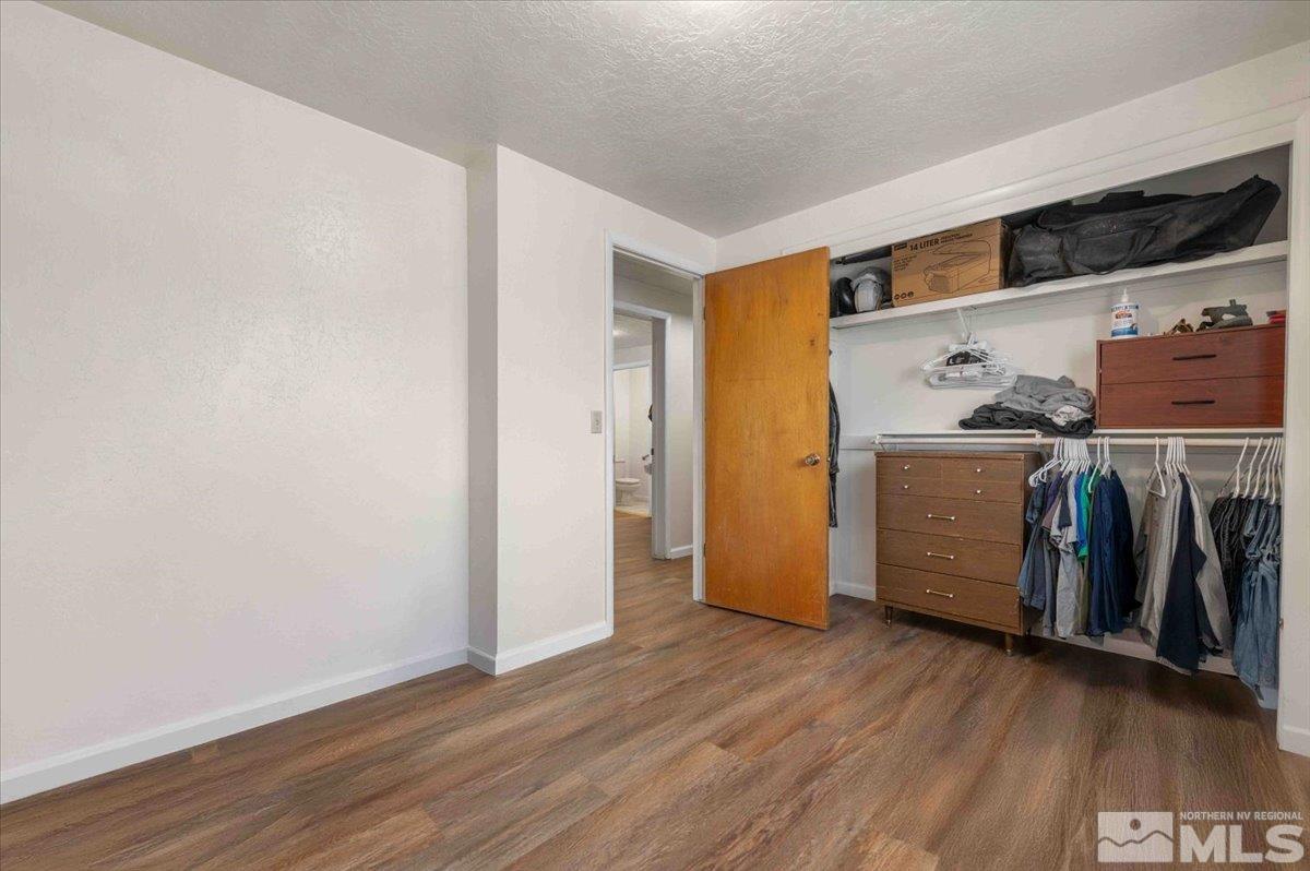 8925 Limnol Street Reno, NV 89506 - Photo 12 of 32 a view of a storage & utility room with washer and dryer