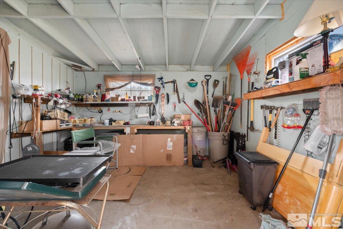 8925 Limnol Street Reno, NV 89506 - Photo 22 of 32 a room with lots of wooden furniture and a view of living room