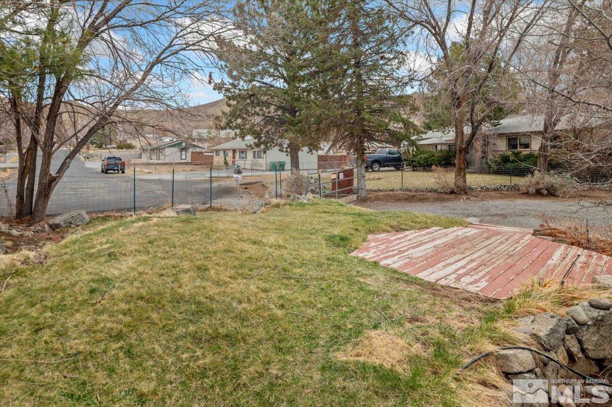 8925 Limnol Street Reno, NV 89506 - Photo 31 of 32 a view of a yard with a house
