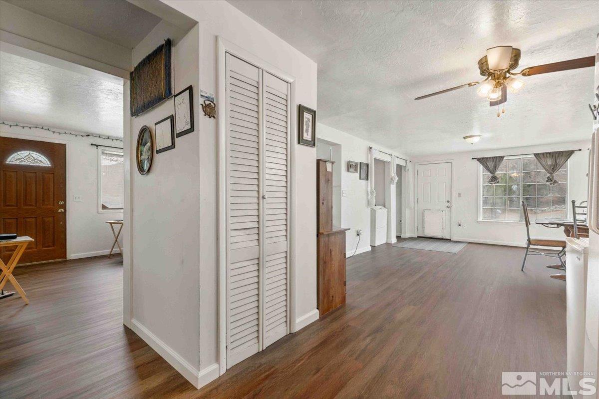 8925 Limnol Street Reno, NV 89506 - Photo 5 of 32 a view of empty room with wooden floor