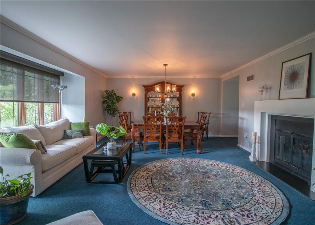 620 Timberline Lane New Stanton, PA 15672 - Photo 12 of 37 a living room with furniture and a fireplace