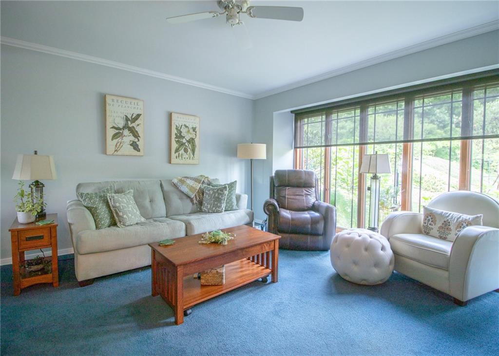 620 Timberline Lane New Stanton, PA 15672 - Photo 14 of 37 a living room with furniture and a large window