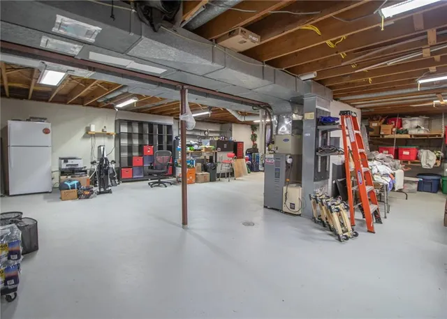 a view of parking garage with cars