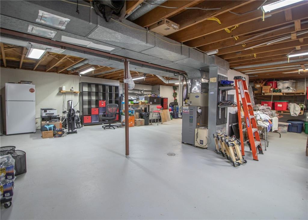 620 Timberline Lane New Stanton, PA 15672 - Photo 21 of 37 a view of parking garage with cars