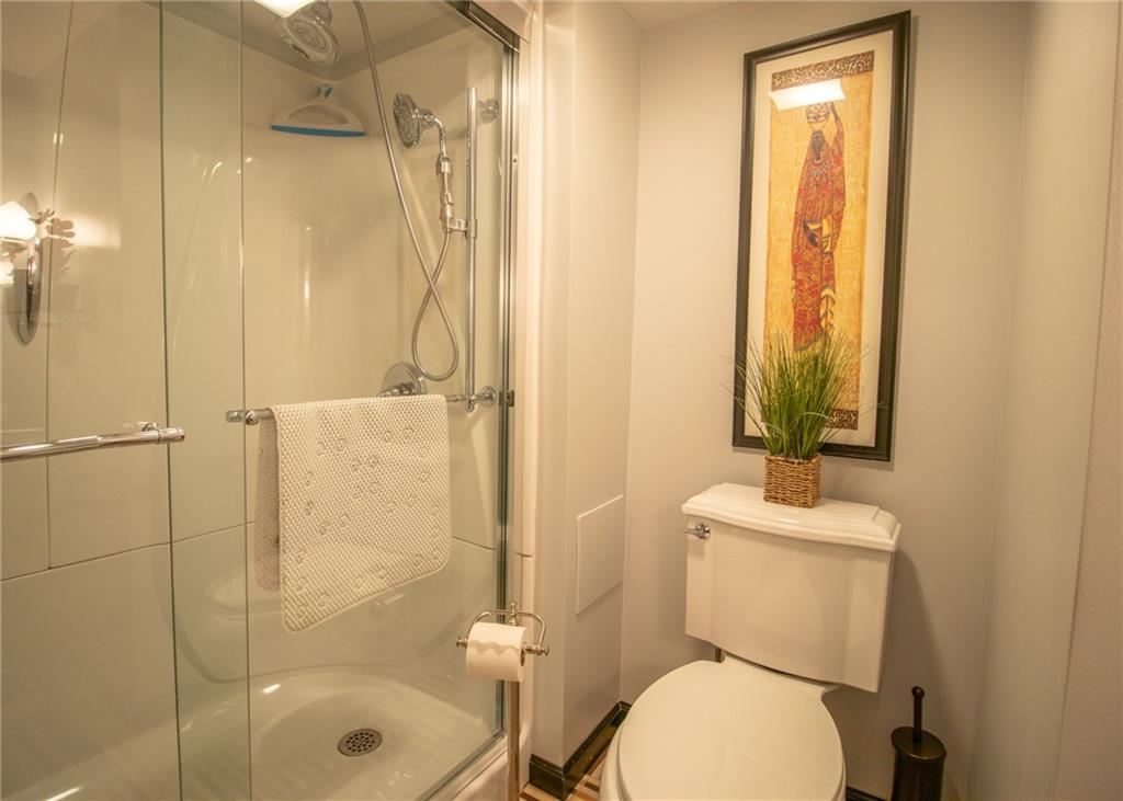 620 Timberline Lane New Stanton, PA 15672 - Photo 23 of 37 a bathroom with a toilet and a shower