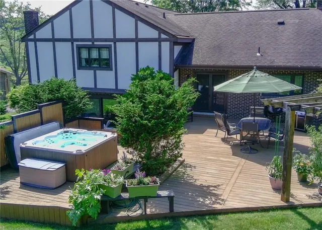 a view of a backyard with sitting area and furniture