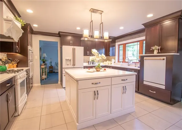 a bathroom with a sink vanity and a mirror