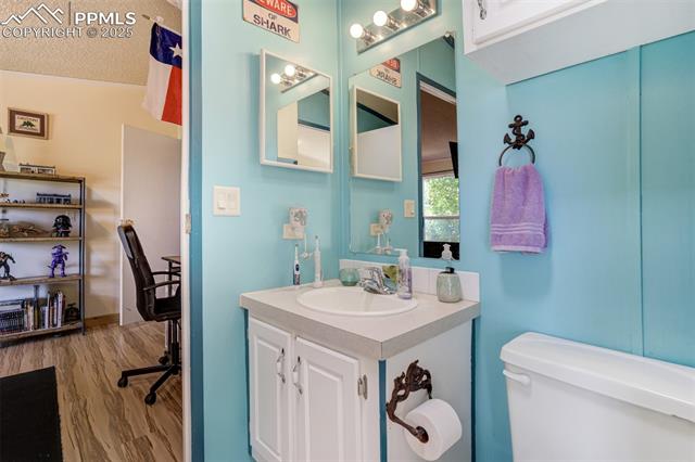 8290 Soap Weed Road Calhan, CO 80808 - Photo 32 of 50 Shared bathroom in between bedrooms Three and four