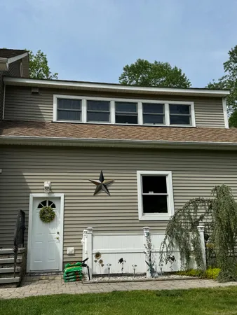 a front view of house with yard