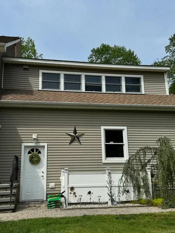 a front view of house with yard