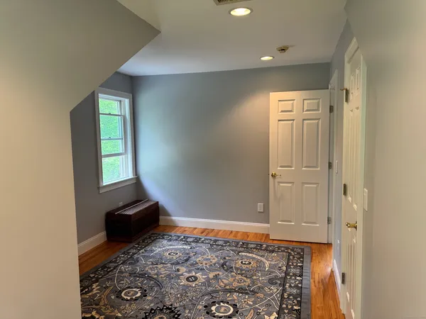 a view of an empty room and window