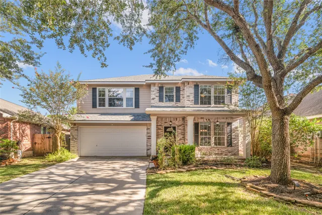 a view of a house with a patio
