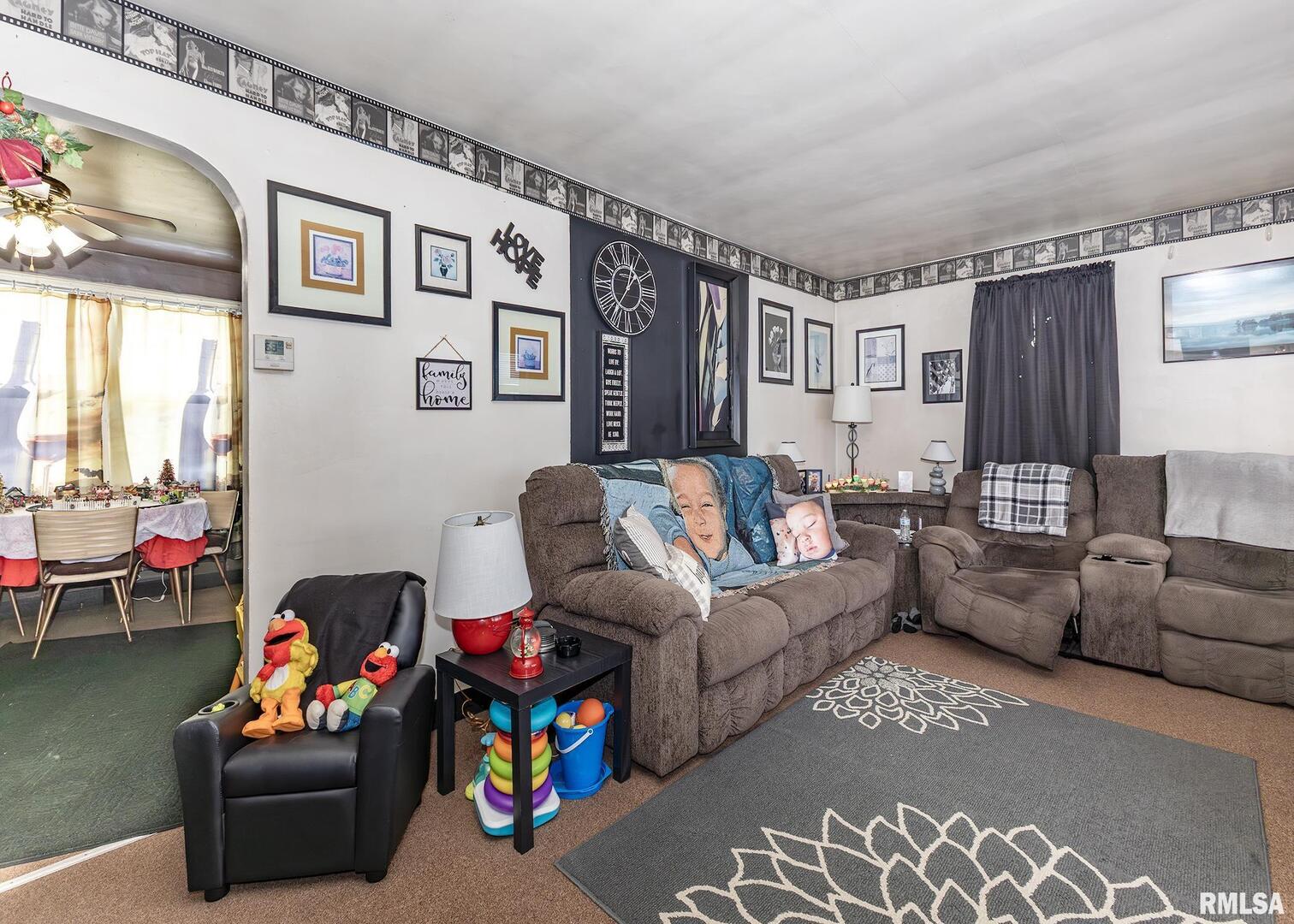 116 West Garfield Street Kewanee, IL 61443 - Photo 8 of 18 a living room with furniture and a window