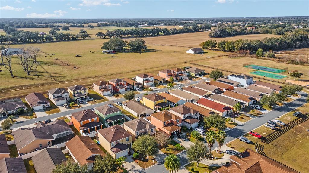 12312 Northeast 48th Loop Oxford, FL 34484 - Photo 24 of 54 an aerial view of residential building and ocean