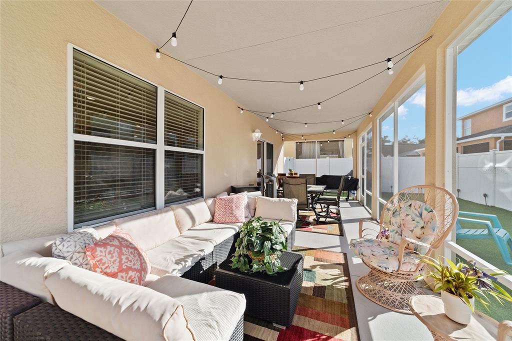 12312 Northeast 48th Loop Oxford, FL 34484 - Photo 38 of 54 a living room with furniture and a large window