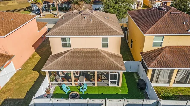 an aerial view of residential building with parking space