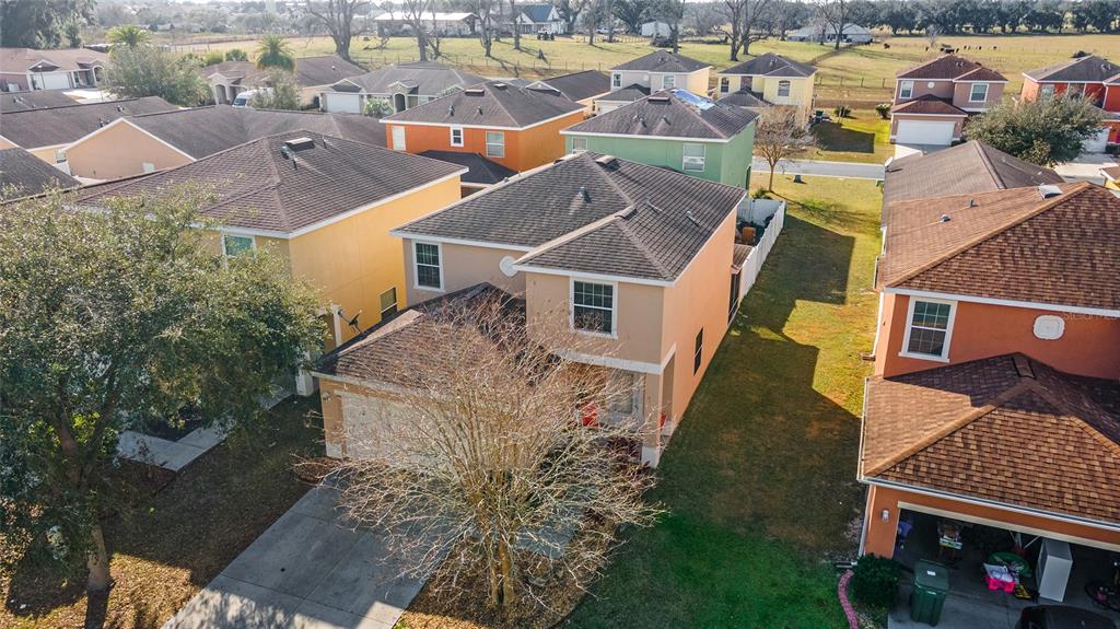 12312 Northeast 48th Loop Oxford, FL 34484 - Photo 51 of 54 an aerial view of a house with a yard