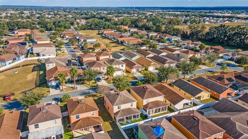 12312 Northeast 48th Loop Oxford, FL 34484 - Photo 53 of 54 an aerial view of a city with lots of residential buildings