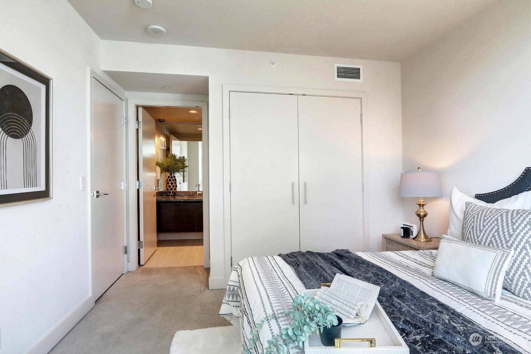 583 Battery Street, Unit 2708N Seattle, WA 98121 - Photo 15 of 30 a bedroom with a bed and a couch