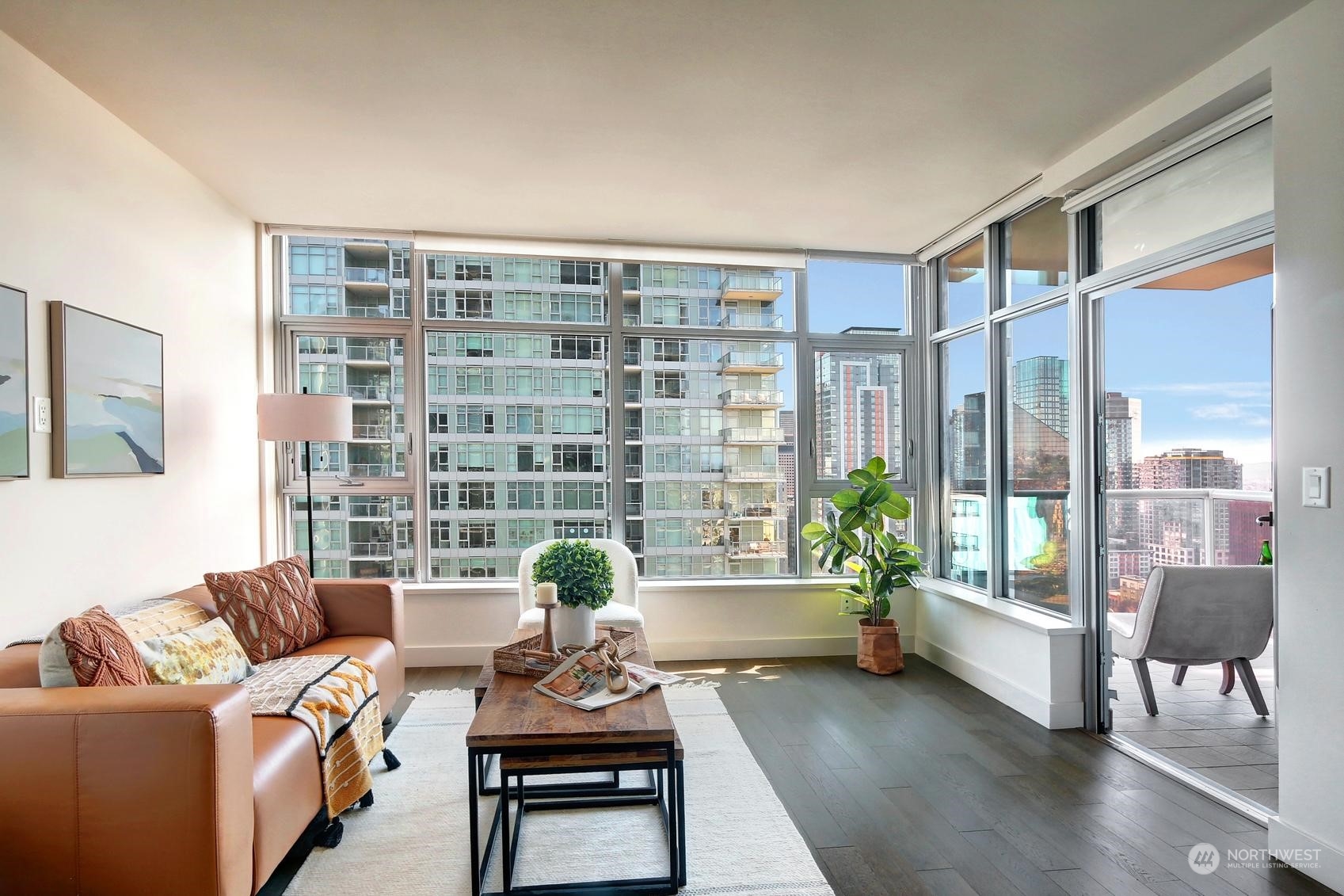 583 Battery Street, Unit 2708N Seattle, WA 98121 - Photo 3 of 30 a living room with furniture and a large window