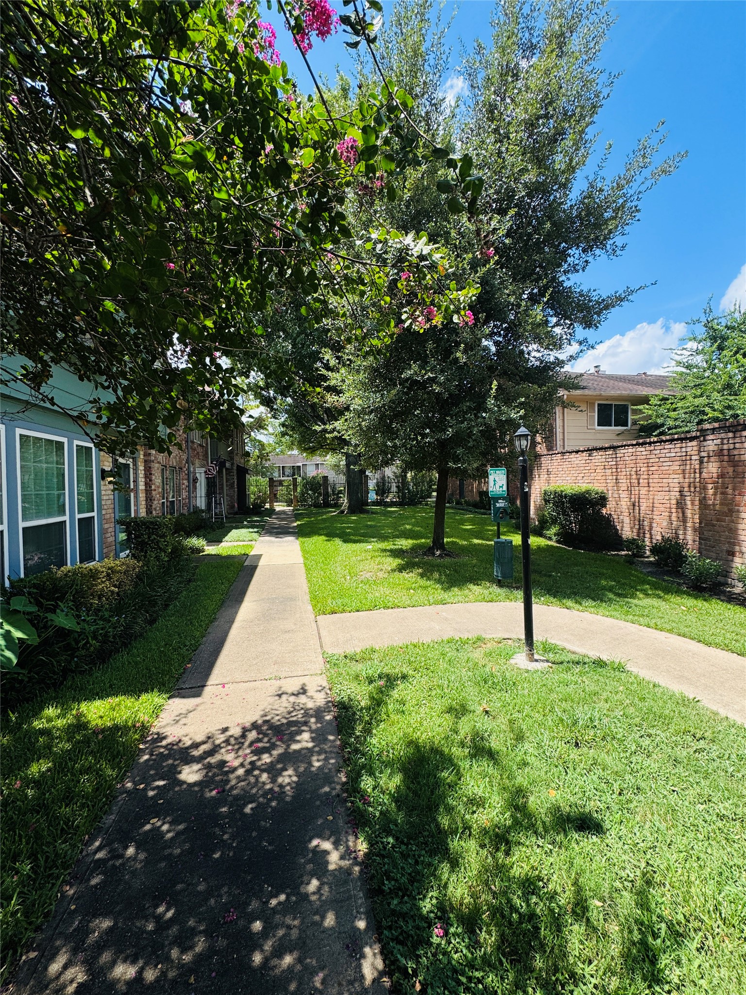 5800 Lumberdale Road, Unit 90 Houston, TX 77092 - Photo 6 of 39 There is also a nice doggy area in the courtyard.