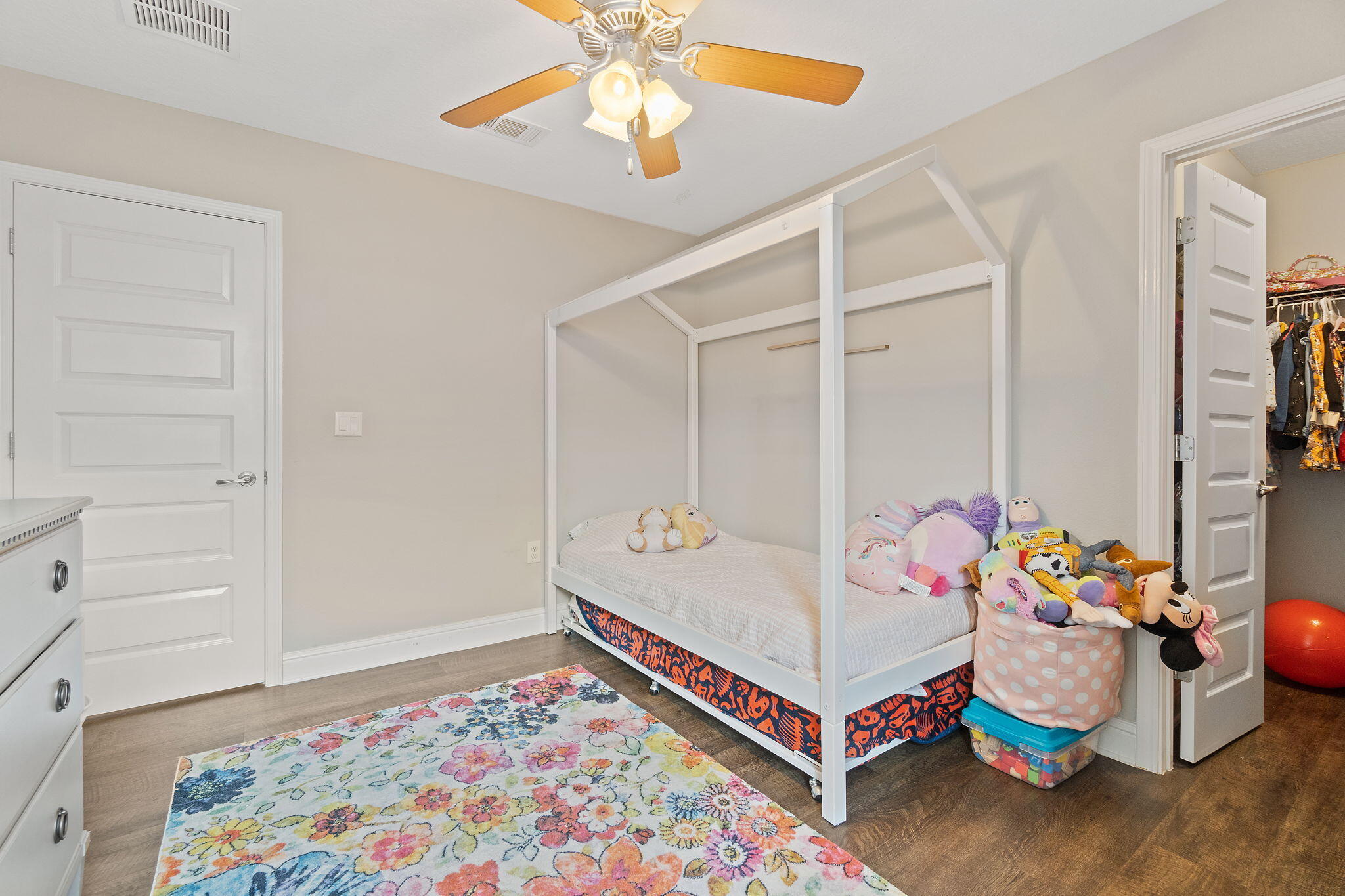 6955 Snug Waters Road Navarre, FL 32566 - Photo 29 of 45 a room with furniture and ceiling fan