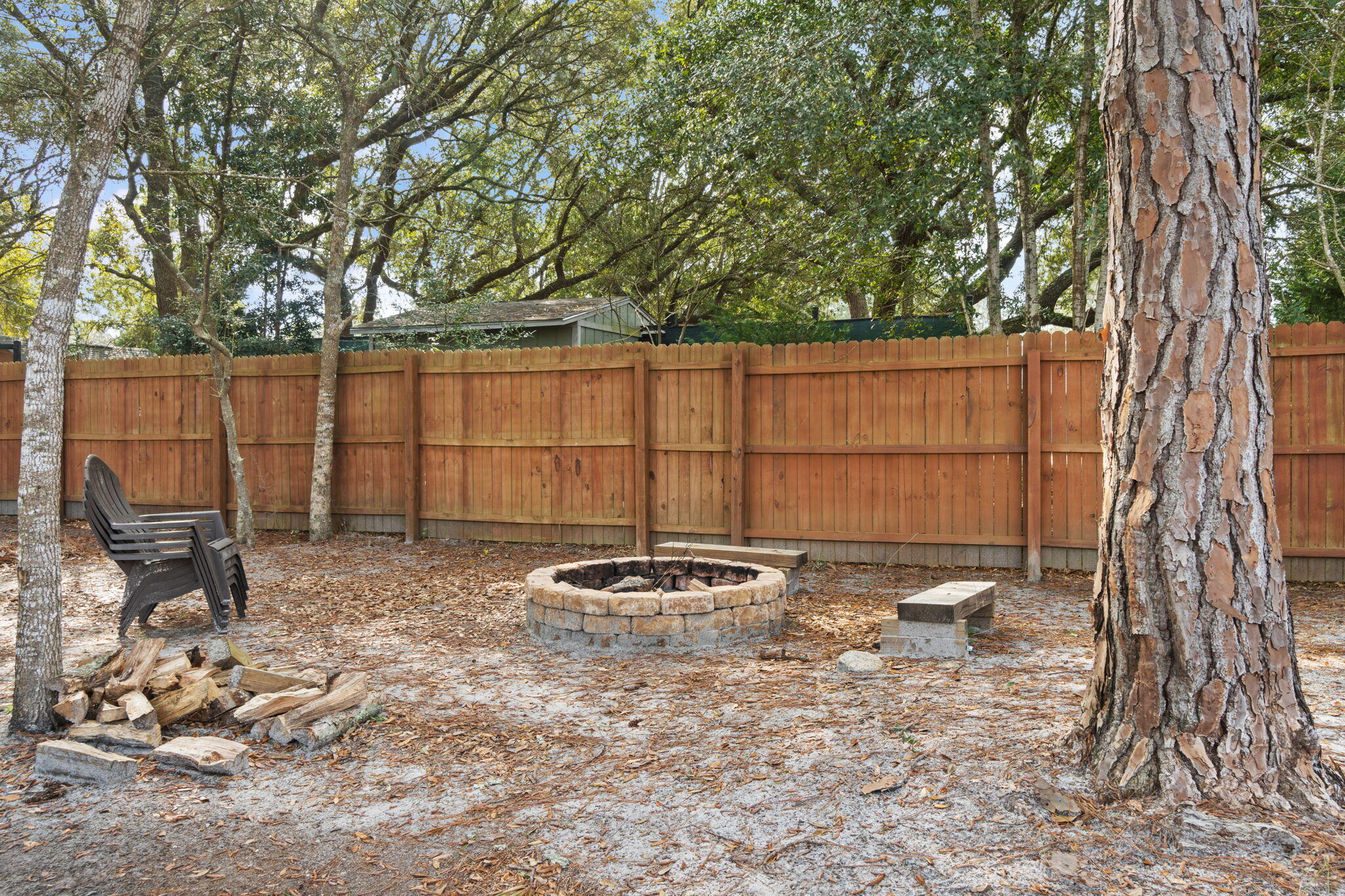 6955 Snug Waters Road Navarre, FL 32566 - Photo 44 of 45 a backyard of a house