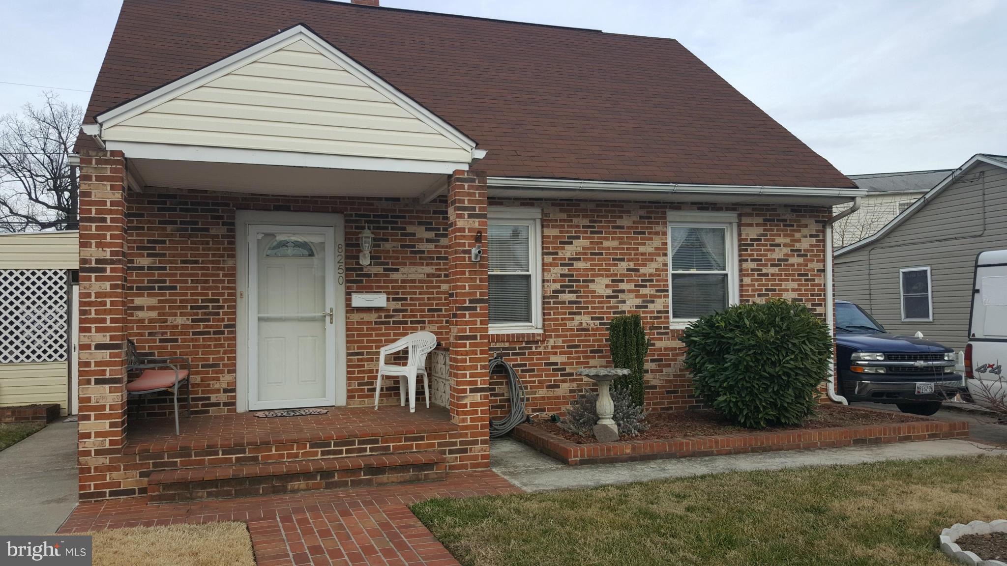 8250 Longpoint Road Baltimore, MD 21222 - Photo 1 of 30 a front view of a house with a yard