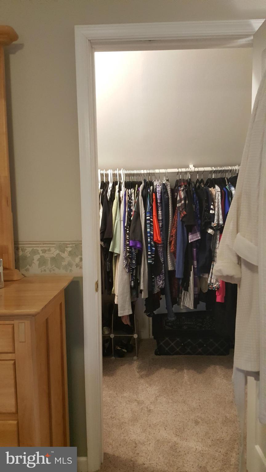 8250 Longpoint Road Baltimore, MD 21222 - Photo 17 of 30 a view of walk in closet with clothes
