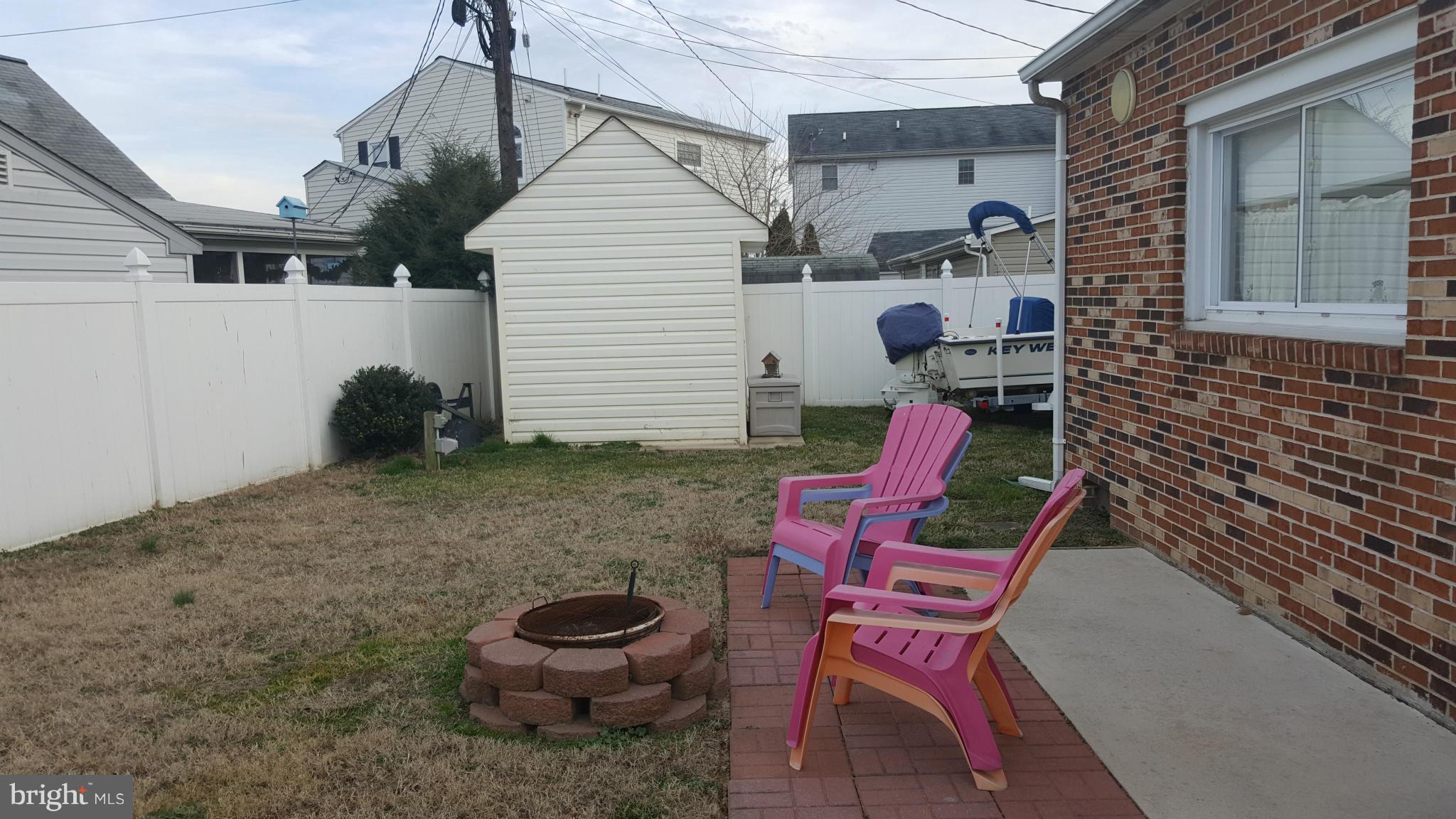8250 Longpoint Road Baltimore, MD 21222 - Photo 24 of 30 a view of backyard with seating space