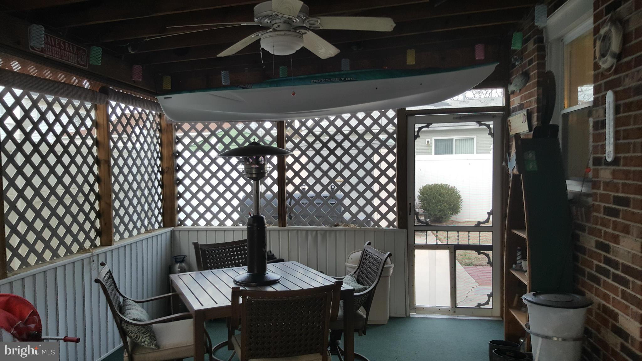 8250 Longpoint Road Baltimore, MD 21222 - Photo 9 of 30 a dining room with furniture and wooden floor