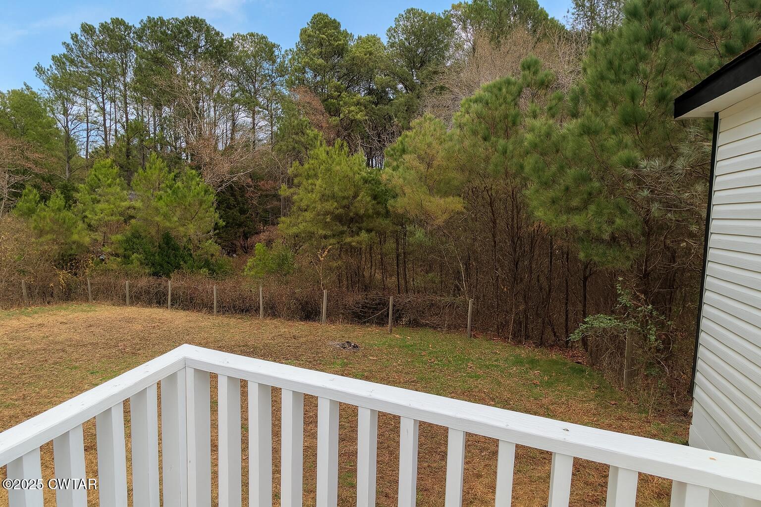 2555 Old Finger Road Finger, TN 38334 - Photo 11 of 13 a view of a deck with a yard