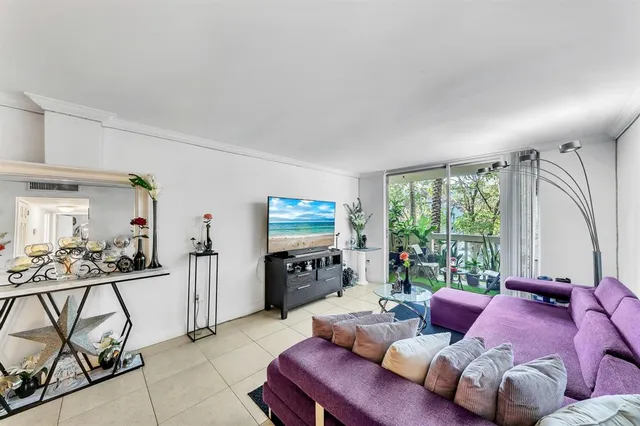 a view of swimming pool from a balcony