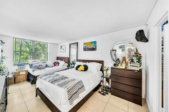 a view of a livingroom with furniture and storage