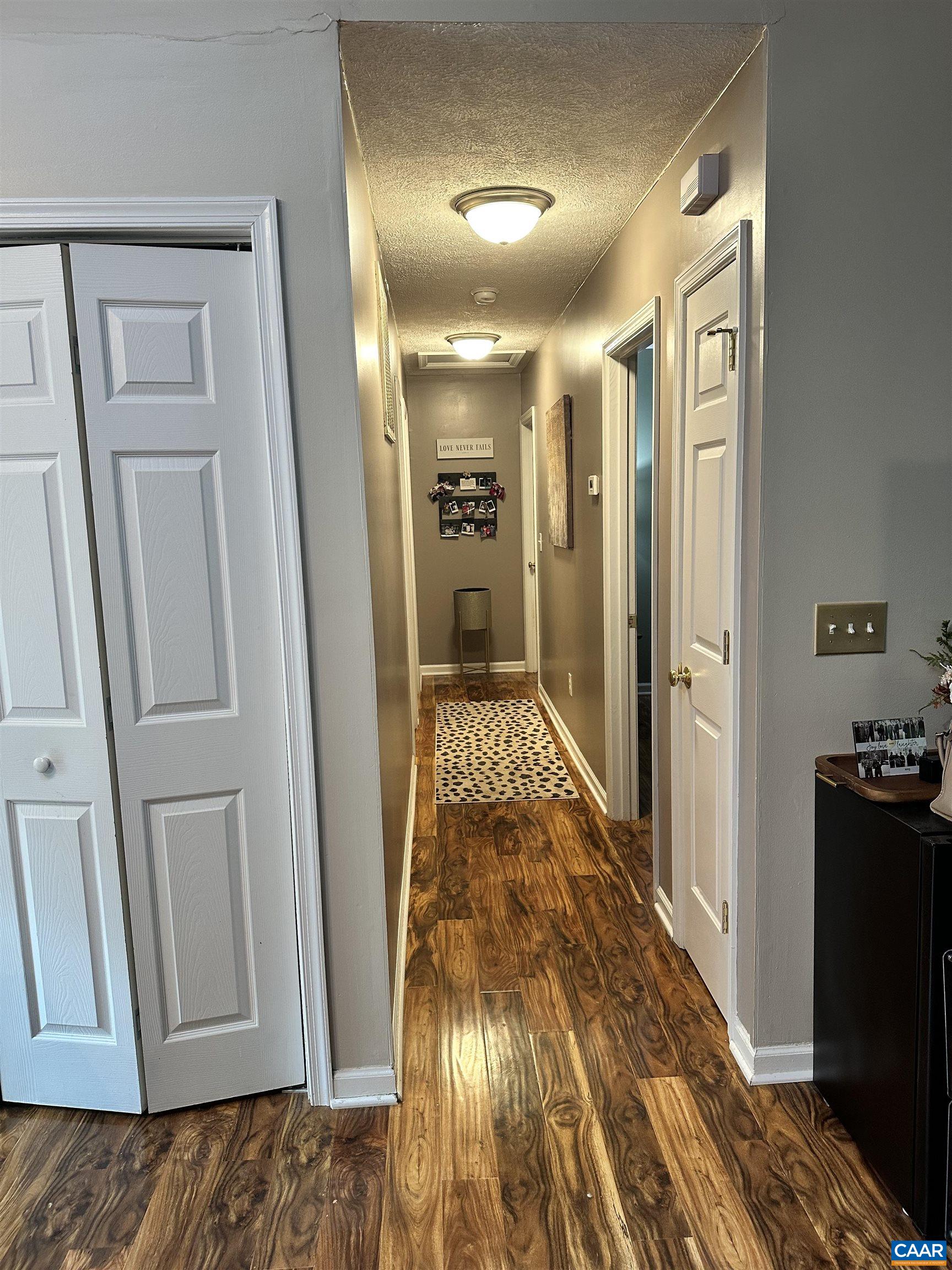 2 Sherwood Drive Palmyra, VA 22963 - Photo 4 of 9 a view of a hallway view with wooden floor