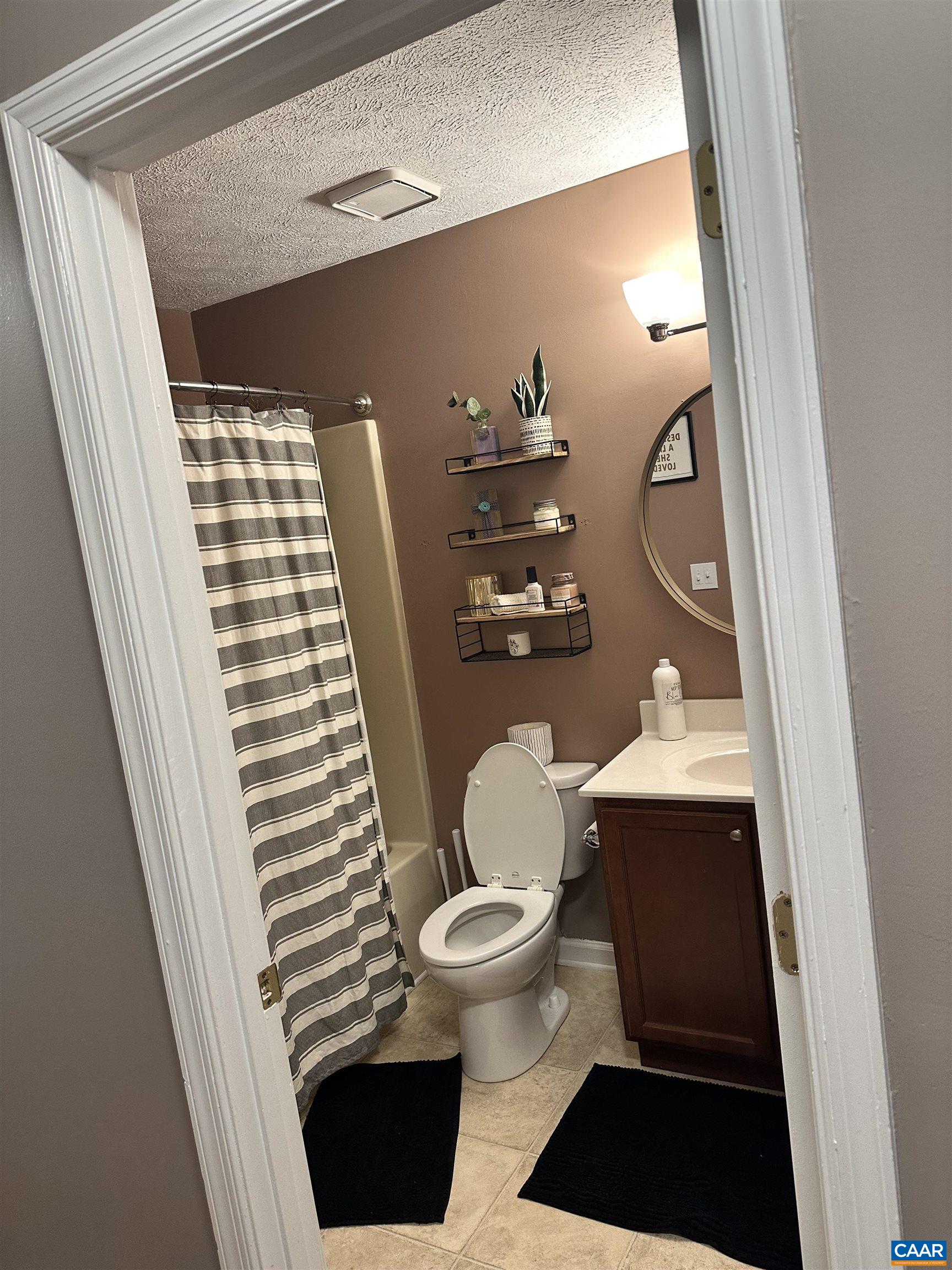2 Sherwood Drive Palmyra, VA 22963 - Photo 5 of 9 a bathroom with a toilet and a shower