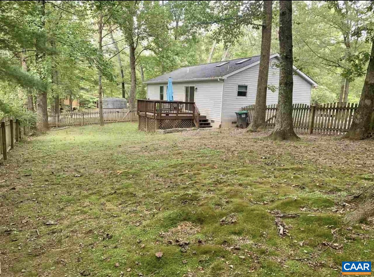 2 Sherwood Drive Palmyra, VA 22963 - Photo 8 of 9 a white house that has a tree in front of it