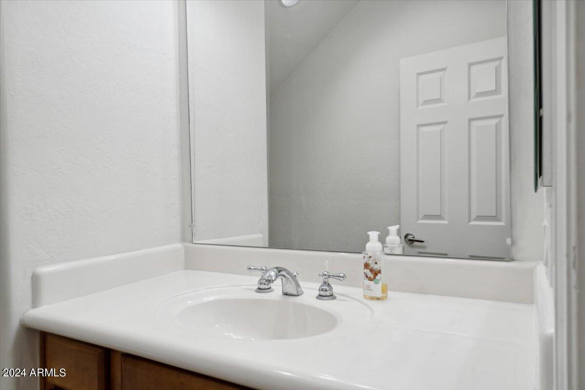 3935 East Rough Rider Road, Unit 1062 Phoenix, AZ 85050 - Photo 13 of 50 13-Powder Room