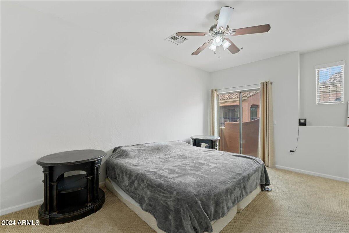 3935 East Rough Rider Road, Unit 1062 Phoenix, AZ 85050 - Photo 20 of 50 20-Primary Bedroom
