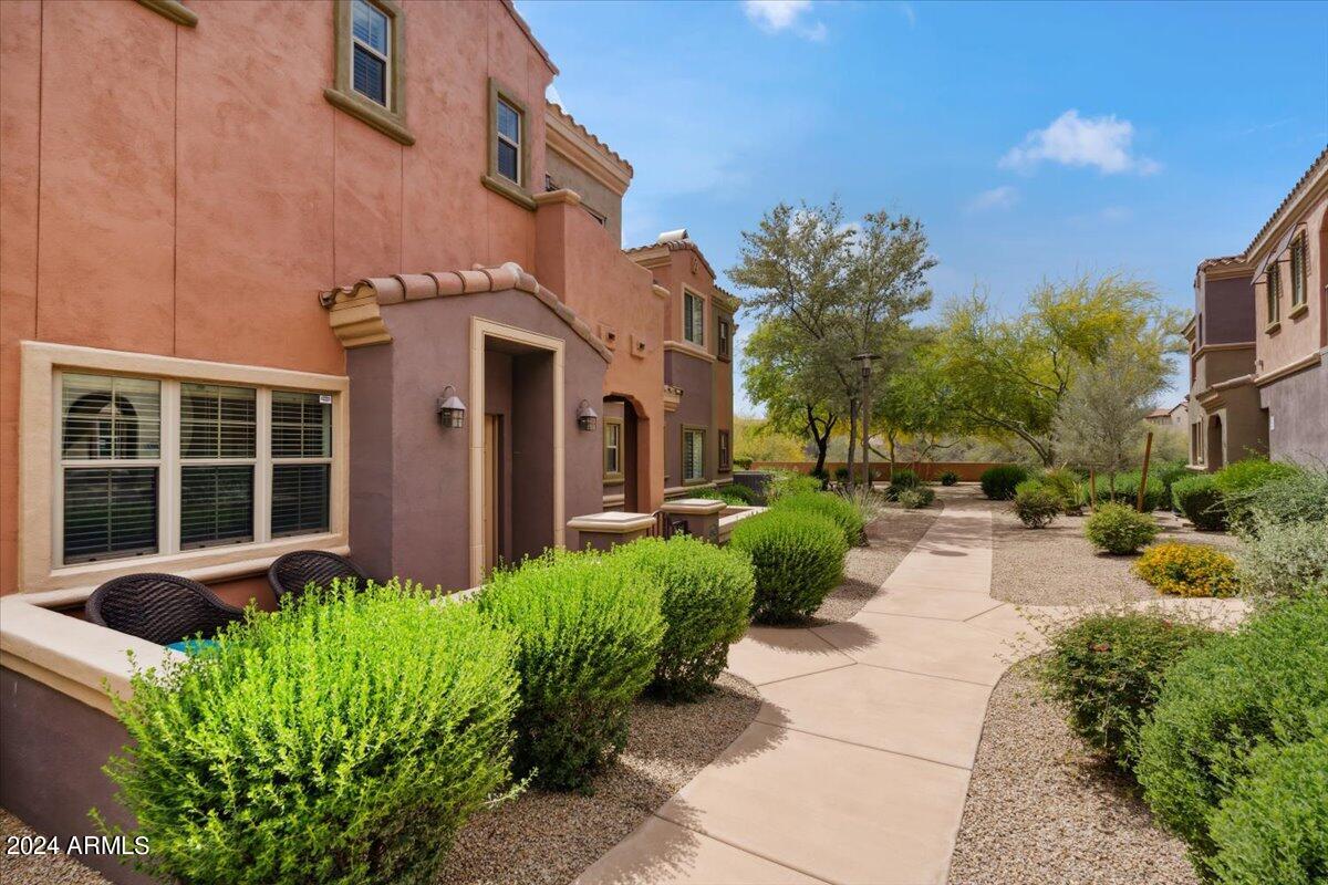 3935 East Rough Rider Road, Unit 1062 Phoenix, AZ 85050 - Photo 2 of 50 02-Front of Home