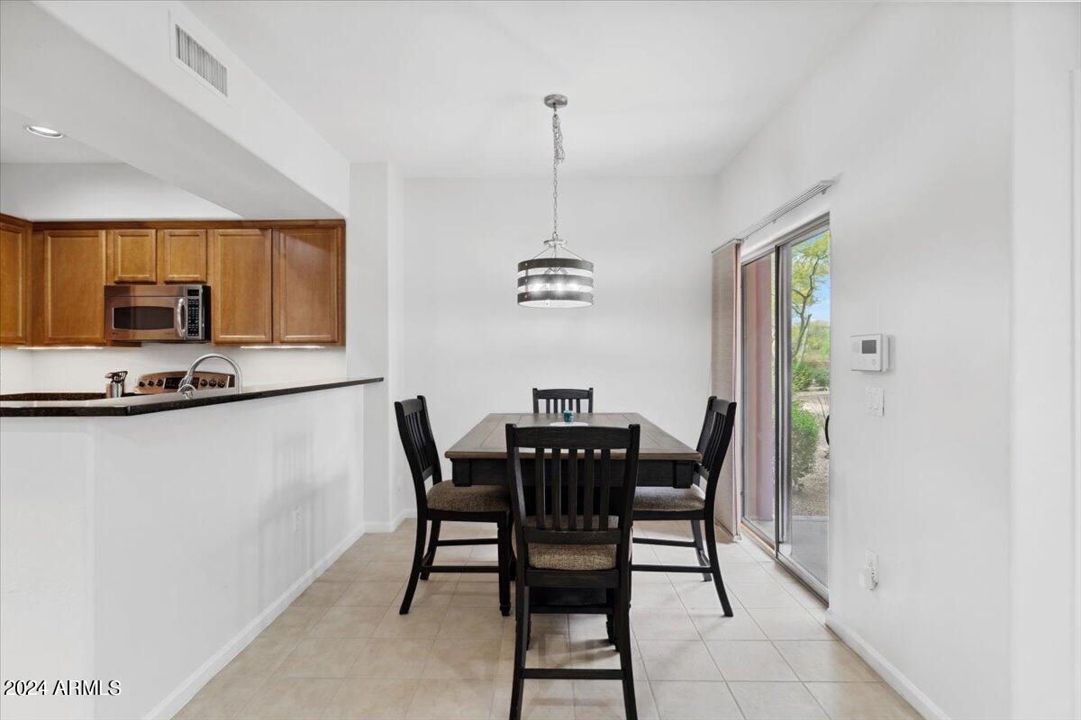 3935 East Rough Rider Road, Unit 1062 Phoenix, AZ 85050 - Photo 8 of 50 08-Dining Room